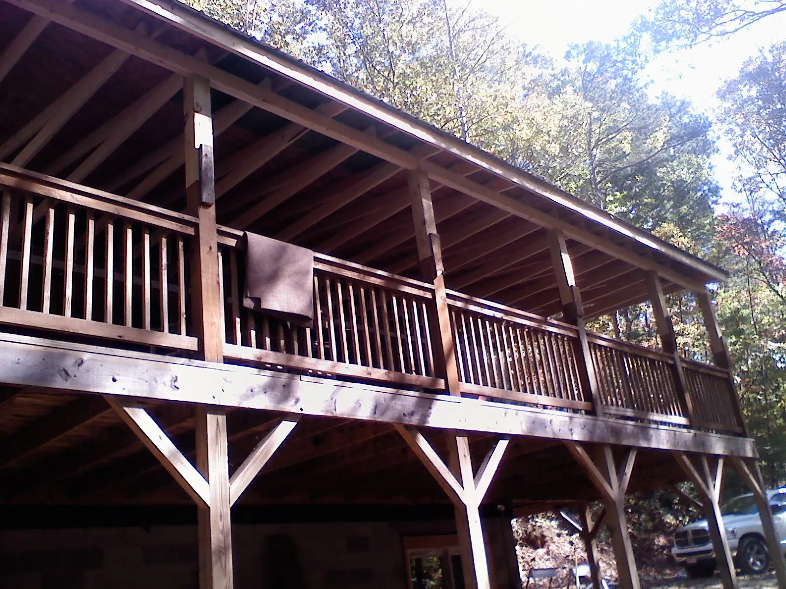 Timber framing under a new elevated porch and deck — Roof Leak Repair in Mississippi State by Roofing Brothers